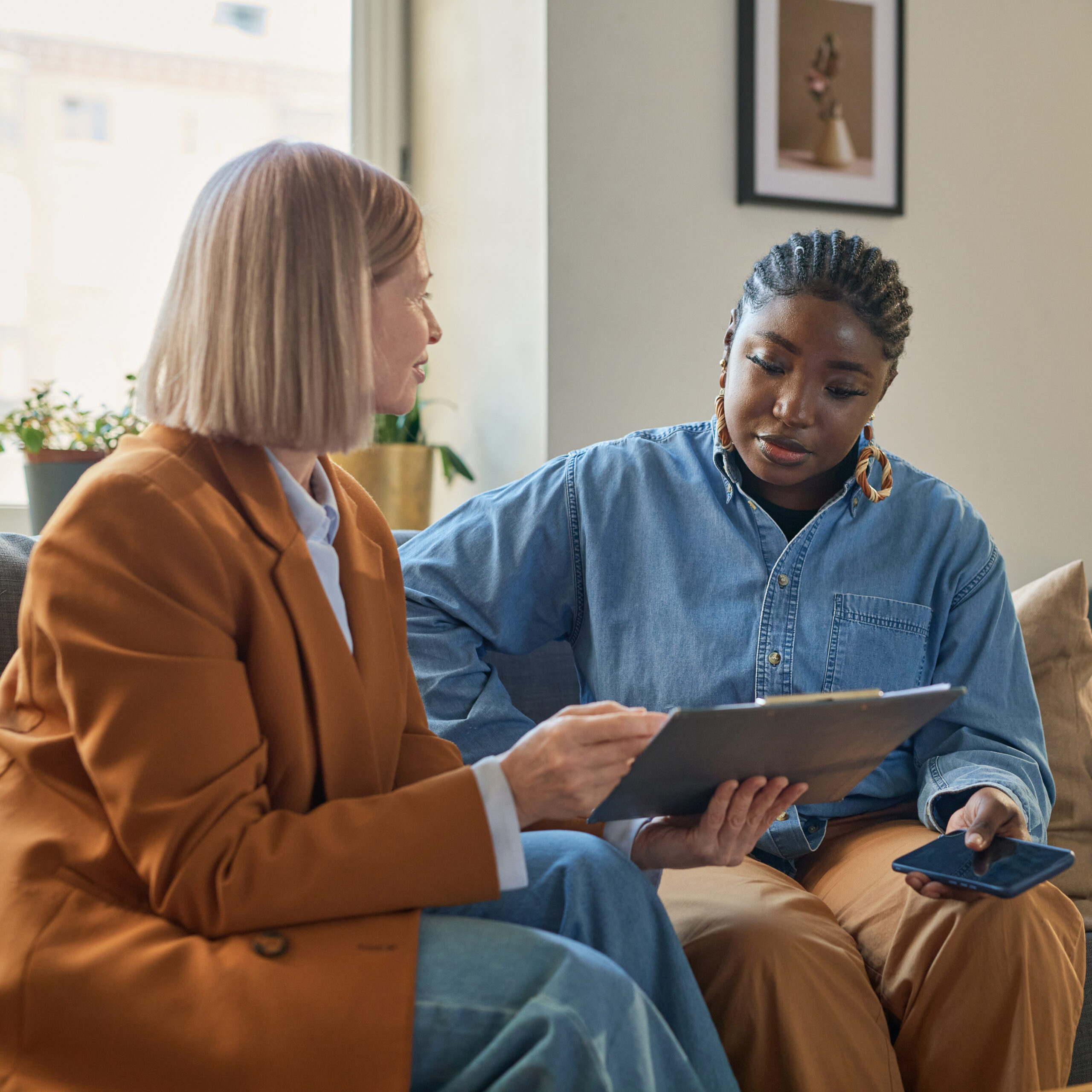 Counselor making a therapy plan with her client based off of needed speciality treatments